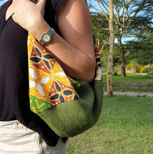 Load image into Gallery viewer, Made from hessian and African print fabric. Magnetic clasp closure. Matching lining, included hessian zip pouch for easy find of your small items.