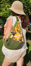 Load image into Gallery viewer, Made from hessian and African print fabric. Magnetic clasp closure. Matching lining, included hessian zip pouch for easy find of your small items.