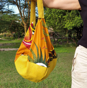 Mustard hessian and matching African print (cotton). Seamless zip closure.