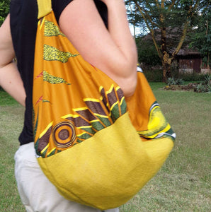 Mustard hessian and matching African print (cotton). Seamless zip closure.