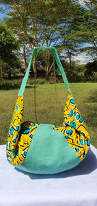 Turquoise hessian and matching African print (cotton). Seamless zip closure.